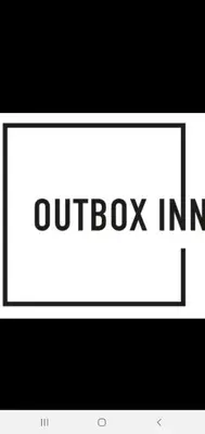 a computer monitor with the outbox inc logo on it at OutBox Inn in Monteverde Costa Rica