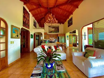 a living room with a couch and a table at Magic Mountain Views Villa in Atenas