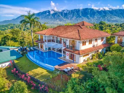 an aerial view of a house with a swimming pool at El Castillo Luxury Boutique Hotel- in Ojochal