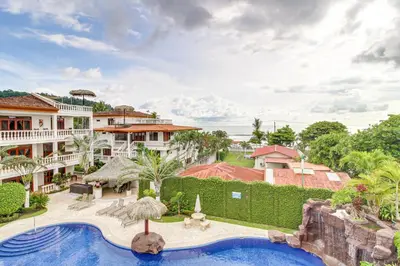 an aerial view of a resort with a swimming pool at La Paloma Blanca B3 in Jacó