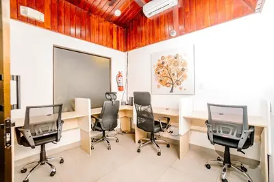an office with a desk and chairs in a room at Hotel Ocotal Bed & Breakfast in Ocotal