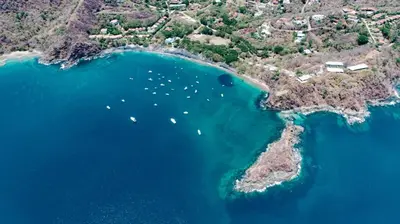 an aerial view of a island with boats in the water at Hotel Ocotal Bed & Breakfast in Ocotal