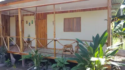 a house under construction with a porch at El Gecko Hotel & Tours in Paquera