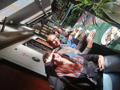 a group of people laying on a machine at Mi Casa Tica in Monteverde Costa Rica