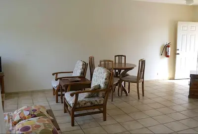 a dining room with a table and chairs at BL10 Bahia Langosta On the Beach 1bed+1bath in Tamarindo