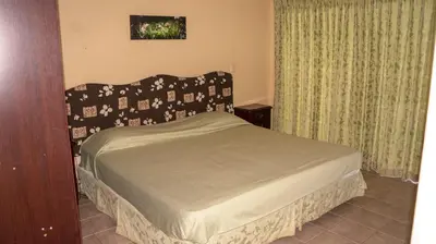 a bedroom with a bed in a room at LC4 La Cometa Center of Tamarindo 1bed+1bath in Tamarindo
