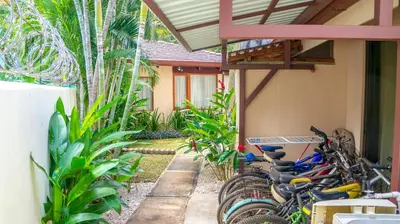 a group of bikes parked next to a building at CWC Casa Wasabi 1bedroom 1bathroom in Tamarindo