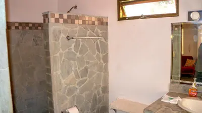 a bathroom with a shower and a sink at CWC Casa Wasabi 1bedroom 1bathroom in Tamarindo