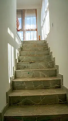 a set of stone stairs in a building at CW2 Casa Wasabi 2bed+1bath in Tamarindo