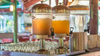 a group ofbeer bottles sitting on top of a counter at Hotel Villas Rio Mar in Dominical