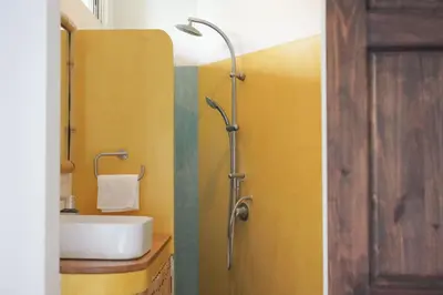 a bathroom with a sink and a shower at Outsite Santa Teresa Playa in Santa Teresa Beach