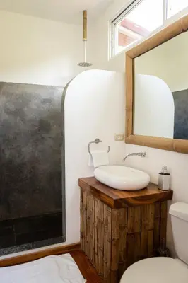 a bathroom with a sink and a mirror at Outsite Santa Teresa Playa in Santa Teresa Beach