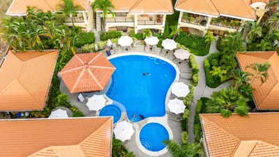 an aerial view of the pool at the resort at Monte Carlo Luxury Condominiums in Jacó