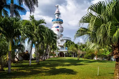 a building with a space shuttle on top of it at Nosara Beach Hotel in Nosara
