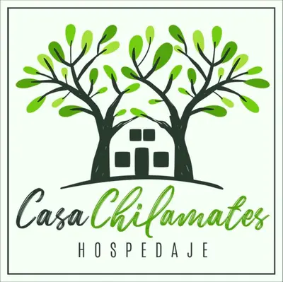 a logo of a house between two trees at casa chilamates in Tortuguero