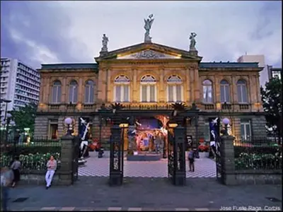 a large building with an entrance in front of it at Hotel Quinta Avenida in San José