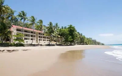 a view of the beach with a hotel at Tango Mar Beachfront Boutique Hotel & Villas in Tambor