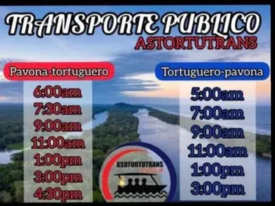a sign for a trip to the tropic puglia and a river at Casa turtle Bogue in Tortuguero