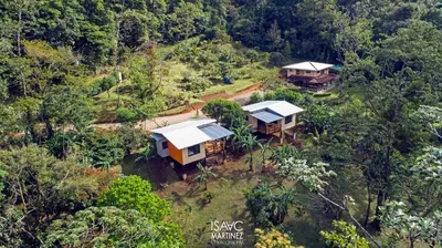an aerial view of a house in the forest at Aves de Tierras Altas in Bijagua