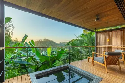 a view from the balcony of a house with a plunge pool at The Green House, Santa Teresa - Adults Only in Santa Teresa Beach