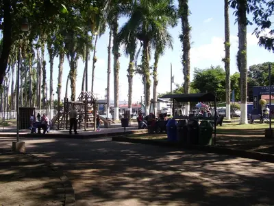 a park with palm trees and a playground at Casa Sophia 3 listings Apartment 1 or Apartment 2 separately or Apt 1 and 2 together all with FO internet in Guápiles