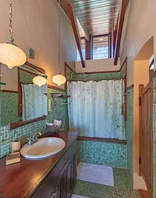 a bathroom with a sink and a mirror at Villa Mango B&B in Nosara