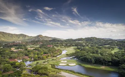 an aerial view of a river with golf courses at Elegant 3BR Condo - Bougainvillea - Reserva Conchal Golf Resort in Playa Conchal