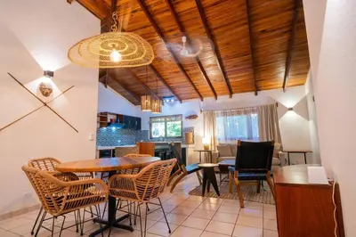 a dining room with a table and chairs at Curiol Boutique Hotel & Lounge in Potrero