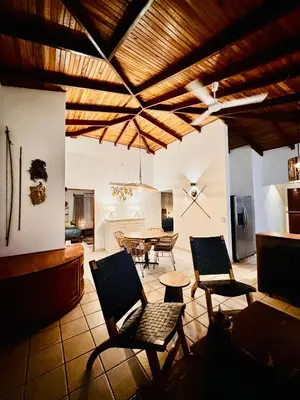 a living room with chairs and a table at Curiol Boutique Hotel & Lounge in Potrero