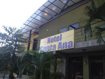 a hotel santa ana sign on the side of a building at Hotel Santa Ana Liberia Airport in Liberia