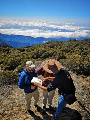 a group of people standing on top of a mountain at Hotel de Montaña Suria in San Gerardo de Dota