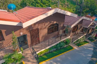 a rendering of a house with a roof at Hotel Boutique Meraki in Caldera