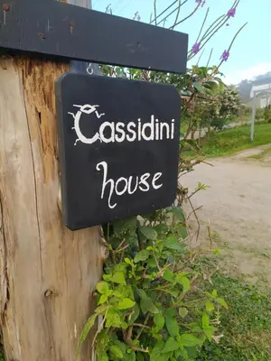 a sign on the side of a house at Cassidini House in Monteverde Costa Rica