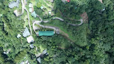 an overhead view of a house in the middle of a forest at Hotel Heliconia - Monteverde in Monteverde Costa Rica