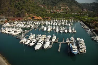 a bunch of boats docked in a harbor at Stay In CR Los Sueños Condos in Jacó