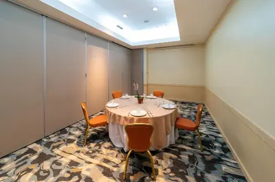 a conference room with a table and chairs at Four Points by Sheraton San Jose Costa Rica in San José