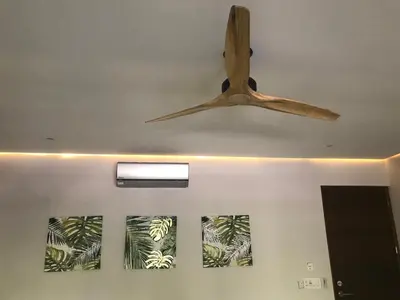 a wooden ceiling fan hanging from a ceiling at Casa Papito in Potrero