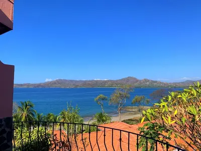 a view of the ocean from a house at Flamingo Marina Resort Studio in Playa Flamingo