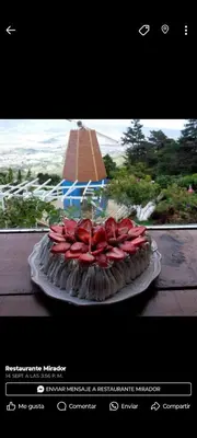 a photograph of a cake on a table at Hotel Vistas del Cielo in Cartago