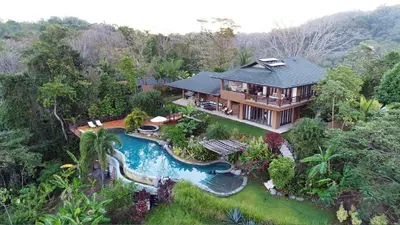 an aerial view of a house with a swimming pool at Villa Numu in Mal País