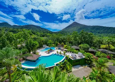 an aerial view of the resort with a mountain in the background at Hotel Lomas del Volcan in Fortuna