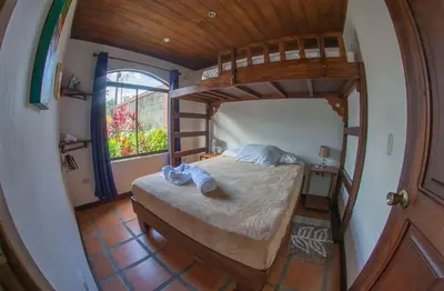 an overhead view of a bedroom with a bunk bed at Sol y Luna Apartments in Fortuna