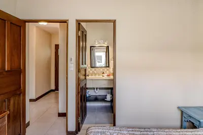 a bathroom with a sink and a mirror at Villa Sol 35 in Playa Hermosa