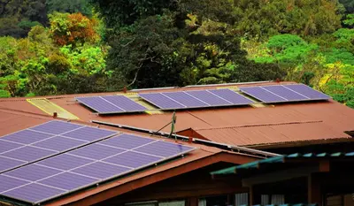 a group of solar panels on the roof of a house at Trapp Family Lodge Monteverde in Monteverde Costa Rica