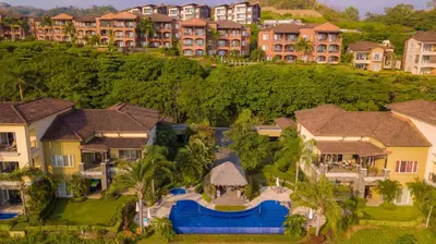an aerial view of a villa in a resort at Vista Bahia 1F 1 bdr Ocean View in Los Suenos in Herradura