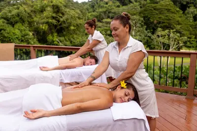 a group of people getting a woman laying on beds at Del Mar 4N 3 bdr Garden View in Los Suenos in Herradura