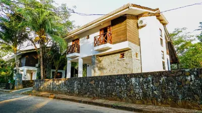 a house on the side of the road at Casa tropical - Fabulous tropical house in Tamarindo