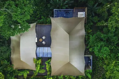 an overhead view of a garden with trees and plants at Nayara Tented Camp in Fortuna
