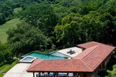 an overhead view of a house with a swimming pool at Incredible Ocean-View Penthouse - Jobo - Reserva Conchal Golf Resort in Playa Conchal