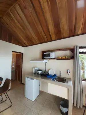 a kitchen with a counter and a sink in a room at Bella Vista Lodge in Monteverde Costa Rica